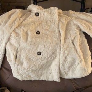 Woman’s large cream color jacket